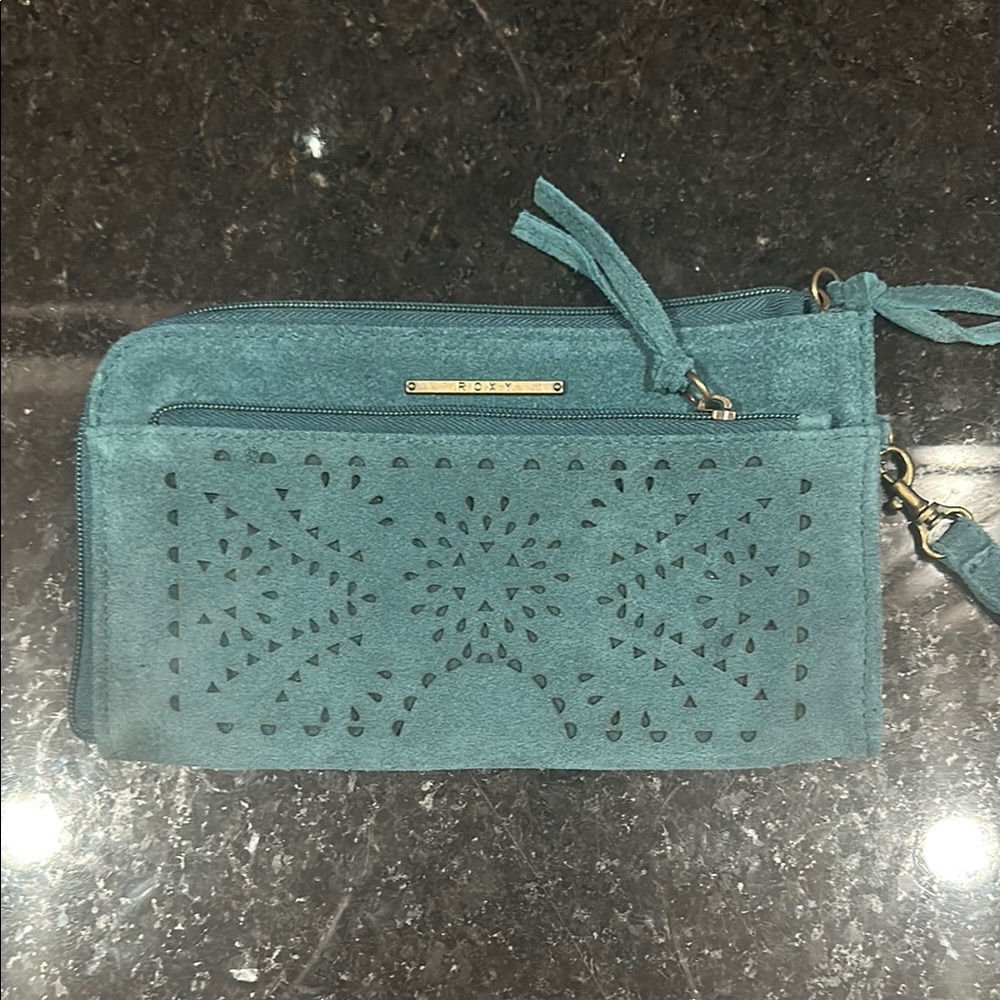 Roxy Blue Suede Clutch with Intricate Cutout Design